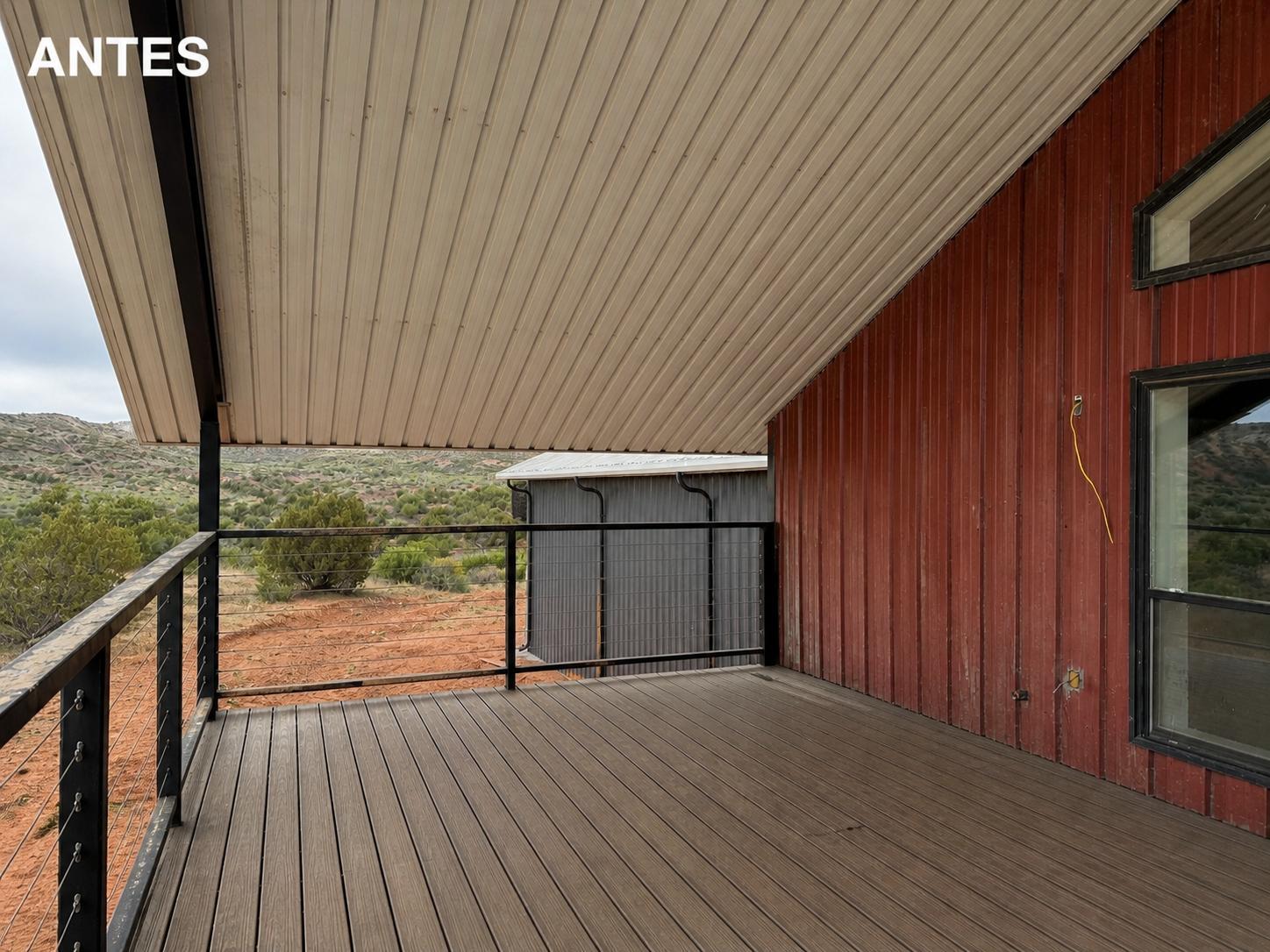Cabin Deck & Siding Refresh — before